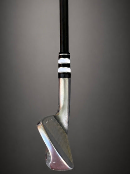 A Classy Jailbird ferrule installed on an iron, seating the black shaft into the polished hosel.